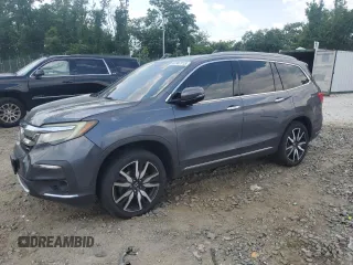 2021 Honda Pilot Touring 8-Passenger z VIN 5FNYF6H95MB048494, wystawiony jako Copart lot #61347115 z przebiegiem 174 016 mil mil oraz Szkoda całkowita • Salvage title. Historia ofert i sprzedaży dostępna na DreamBid. Obrazek 1.