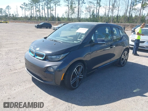 2014 BMW i3 with VIN WBY1Z4C54EV273699, listed as a IAAI auction lot 41549973 with 109,947 mi miles and . Bid and sale history available at DreamBid. Image 2.