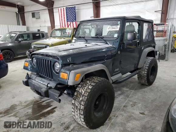 2006 Jeep Wrangler SE with VIN 1J4FA29S36P724699, listed as a Copart auction lot 41764425 with 129,016 mi miles and Salvage Title. Bid and sale history available at carsss.com. Image 1.