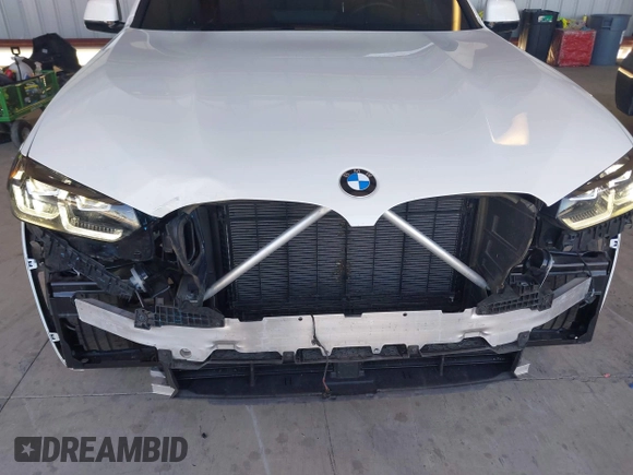2024 BMW X4 xDrive30i with VIN 5UX33DT00R9U63349, listed as a IAAI auction lot 42322299 with 23,526 mi miles and . Bid and sale history available at DreamBid. Image 6.