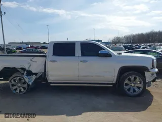 2017 GMC Sierra 1500 Denali with VIN 3GTU2PEJ5HG239623, listed as a IAAI auction lot 41783709 with 61,641 mi miles. Bid and sale history available at carsss.com. Image 13.