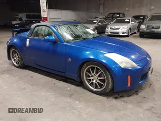 2005 Nissan 350Z Touring z VIN JN1AZ36A95M753704, wystawiony jako IAAI lot #41226946 z przebiegiem 94 351 mil mil oraz . Historia ofert i sprzedaży dostępna na DreamBid. Obrazek 1.