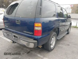 2002 Chevrolet Tahoe LS with VIN 1GNEC13T92R201832, listed as a IAAI auction lot 41896370 with 262,491 mi miles and . Bid and sale history available at DreamBid. Image 4.