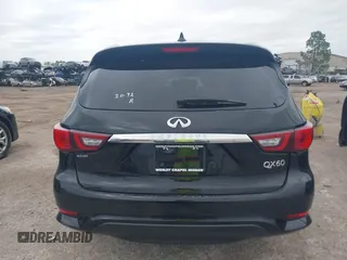 2020 Infiniti QX60 Pure with VIN 5N1DL0MN0LC527050, listed as a IAAI auction lot 41734032 with 71,204 mi miles and . Bid and sale history available at DreamBid. Image 16.