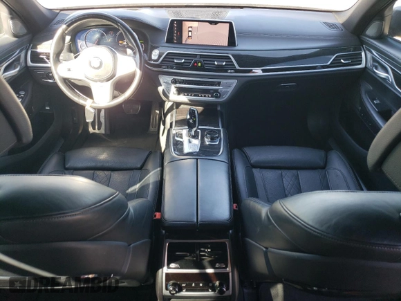 2019 BMW 7 Series 750i with VIN WBA7F0C56KGM25430, listed as a Copart auction lot 42048135 with 74,717 mi miles and Salvage title. Bid and sale history available at DreamBid. Image 8.