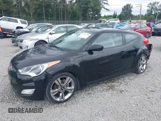 2012 Hyundai Veloster w/Gray Int with VIN KMHTC6AD4CU062034, listed as a IAAI auction lot 42371790 with 116,861 mi miles and . Bid and sale history available at DreamBid. Image 2.