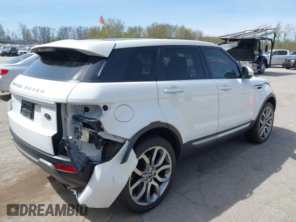 2015 Land Rover Range Rover Evoque Prestige with VIN SALVV2BG4FH076675, listed as a IAAI auction lot 42138353 with 99,751 mi miles and . Bid and sale history available at DreamBid. Image 4.