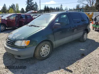 2001 Toyota Sienna LE with VIN 4T3ZF13C81U380901, listed as a Copart auction lot 54053615 with 194,910 mi miles and Salvage Title. Bid and sale history available at DreamBid. Image 1.
