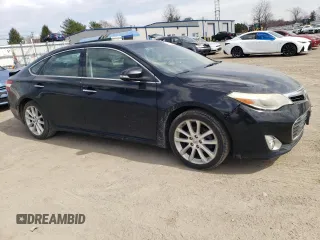 2013 Toyota Avalon XLE with VIN 4T1BK1EB8DU060623, listed as a Copart auction lot 50085975 with 172,665 mi miles and Salvage Title. Bid and sale history available at DreamBid. Image 4.