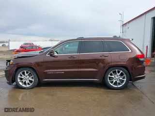 2015 Jeep Grand Cherokee Summit with VIN 1C4RJFJT7FC840560, listed as a IAAI auction lot 41596868 with 173,392 mi miles. Bid and sale history available at carsss.com. Image 14.