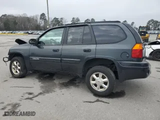 2004 GMC Envoy SLE with VIN 1GKDS13S942432115, listed as a Copart auction lot 43817125 with 147,228 mi miles and Salvage Title. Bid and sale history available at carsss.com. Image 2.