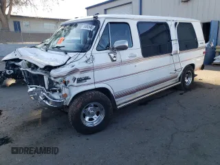 1990 Chevrolet Chevy Van z VIN 2GBEG25KXL4156338, wystawiony jako Copart lot #73499394 z przebiegiem 113 455 mil mil oraz Szkody całkowita. Historia ofert i sprzedaży dostępna na DreamBid. Obrazek 1.