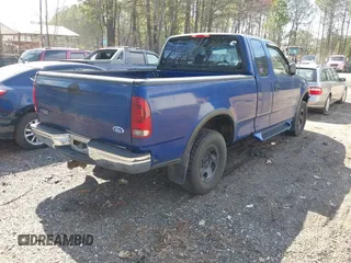 1997 Ford F-150 XL with VIN 1FTDX18W4VNB57679, listed as a IAAI auction lot 41918107 with 132,960 mi miles. Bid and sale history available at carsss.com. Image 4.