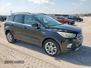 2017 Ford Escape SE z VIN 1FMCU0GD2HUC07371, wystawiony jako Copart lot #59223875 z przebiegiem 26 805 mil mil oraz Szkoda całkowita • Salvage title. Historia ofert i sprzedaży dostępna na DreamBid. Obrazek 4.