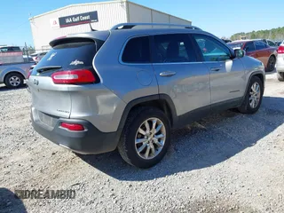 2016 Jeep Cherokee Limited with VIN 1C4PJLDB8GW239294, listed as a IAAI auction lot 41675712 with 140,491 mi miles. Bid and sale history available at carsss.com. Image 4.