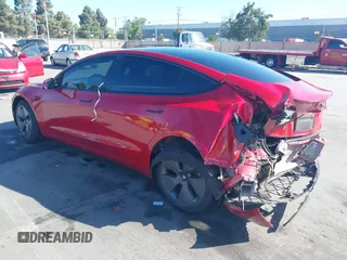 2023 Tesla Model 3 with VIN 5YJ3E1EA1PF385490, listed as a IAAI auction lot 42315884 with 17,590 mi miles and . Bid and sale history available at DreamBid. Image 3.
