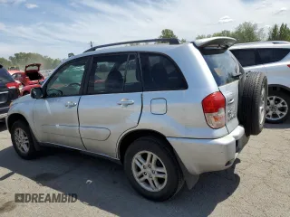 2003 Toyota RAV4 with VIN JTEGH20V936012689, listed as a Copart auction lot 61997965 with 214,693 mi miles and Clean title. Bid and sale history available at DreamBid. Image 2.