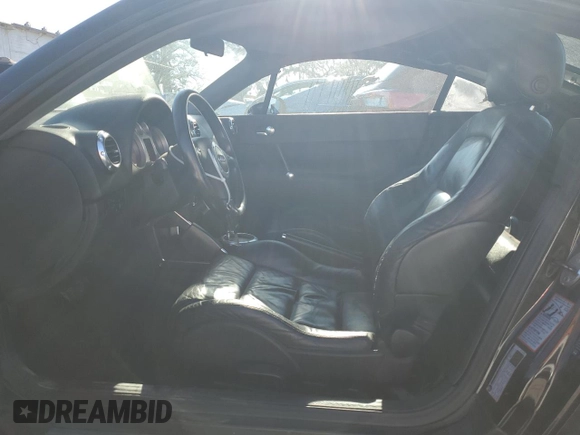 2006 Audi TT with VIN TRUSC28N561007935, listed as a Copart auction lot 83048974 with 125,458 mi miles and Salvage title. Bid and sale history available at DreamBid. Image 7.