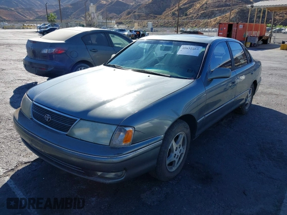 1998 Toyota Avalon XL with VIN 4T1BF18B3WU288614, listed as a IAAI auction lot 40632663 with 185,987 mi miles and . Bid and sale history available at DreamBid. Image 2.