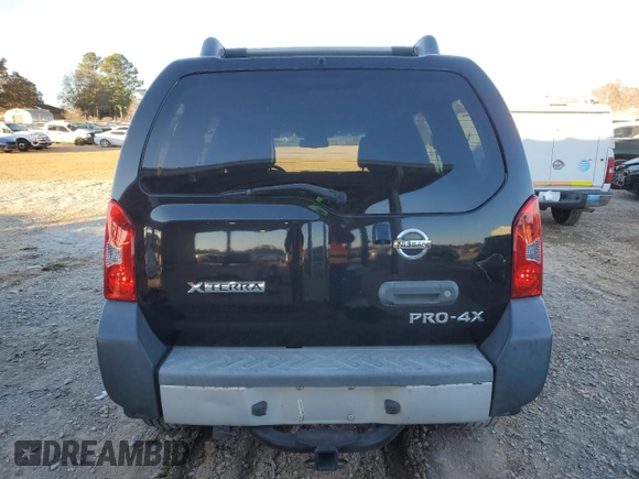 2014 Nissan Xterra X with VIN 5N1AN0NW9EN812437, listed as a Copart auction lot 83905504 with 118,805 mi miles and Salvage Title. Bid and sale history available at DreamBid. Image 6.