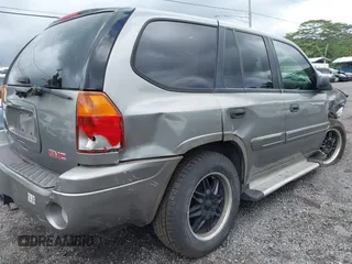 2005 GMC Envoy SLT z VIN 1GKDS13S152161472, wystawiony jako IAAI lot #40110978 z przebiegiem 141 908 mil mil oraz . Historia ofert i sprzedaży dostępna na DreamBid. Obrazek 19.