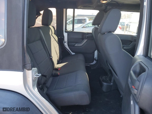 2012 Jeep Wrangler Unlimited Sport with VIN 1C4BJWDG6CL240737, listed as a Copart auction lot 50333305 with 97,799 mi miles and Clean Title. Bid and sale history available at carsss.com. Image 11.