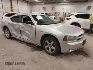 2009 Dodge Charger SE with VIN 2B3KA43V19H609614, listed as a IAAI auction lot 41515678 with 195,787 mi miles. Bid and sale history available at carsss.com. Image 1.