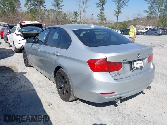 2014 BMW 3 Series 335i xDrive with VIN WBA3B9G52ENR91044, listed as a IAAI auction lot 41807408 with 200,000 mi miles and . Bid and sale history available at carsss.com. Image 3.