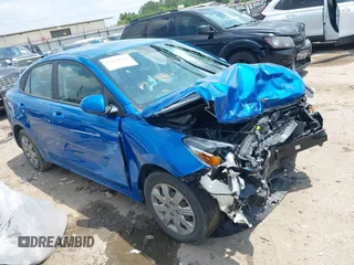 2023 Kia Rio LX z VIN 3KPA24AD5PE566812, wystawiony jako IAAI lot #42124641 z przebiegiem 60 923 mil mil oraz . Historia ofert i sprzedaży dostępna na DreamBid. Obrazek 1.