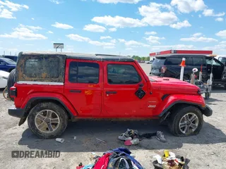 2018 Jeep Wrangler Unlimited Sahara with VIN 1C4HJXEG6JW174359, listed as a IAAI auction lot 42009968 with 79,830 mi miles and . Bid and sale history available at DreamBid. Image 14.