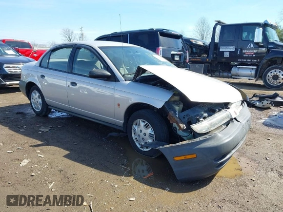 1999 Saturn SL z VIN 1G8ZH5281XZ376254, wystawiony jako IAAI lot #41857372 z przebiegiem 229 836 mil mil oraz . Historia ofert i sprzedaży dostępna na DreamBid. Obrazek 1.