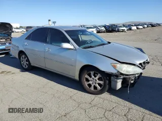 2006 Toyota Camry LE z VIN 4T1BF30K46U116549, wystawiony jako Copart lot #55606105 z przebiegiem 232 128 mil mil oraz Szkoda całkowita • Salvage title. Historia ofert i sprzedaży dostępna na DreamBid. Obrazek 4.