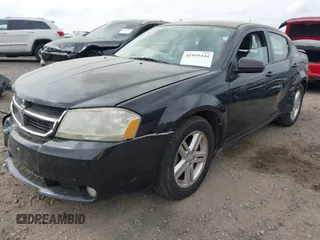 2010 Dodge Avenger R/T with VIN 1B3CC5FB1AN200983, listed as a IAAI auction lot 41959344 with 121,934 mi miles and . Bid and sale history available at DreamBid. Image 2.
