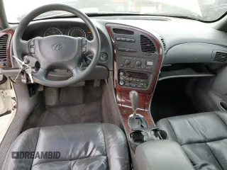 2003 Oldsmobile Aurora z VIN 1G3GS64C834100084, wystawiony jako Copart lot #76966704 z przebiegiem 70 263 mil mil oraz Szkody całkowita. Historia ofert i sprzedaży dostępna na DreamBid. Obrazek 8.