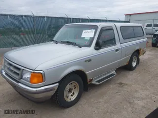1997 Ford Ranger XL with VIN 1FTCR10U8VPA00709, listed as a IAAI auction lot 42071941 with 153,501 mi miles. Bid and sale history available at carsss.com. Image 2.