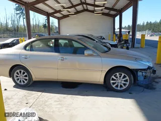 2004 Lexus ES 330 with VIN JTHBA30G340003869, listed as a IAAI auction lot 42024907 with 240,425 mi miles. Bid and sale history available at carsss.com. Image 14.