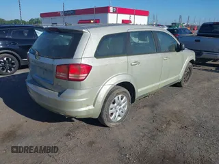 2014 Dodge Journey American Value with VIN 3C4PDCAB2ET259183, listed as a IAAI auction lot 42207868 with 132,564 mi miles and . Bid and sale history available at DreamBid. Image 4.