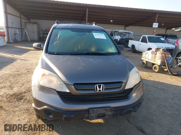 2009 Honda CR-V LX with VIN 5J6RE48389L011915, listed as a IAAI auction lot 41301796 with 214,807 mi miles. Bid and sale history available at carsss.com. Image 13.
