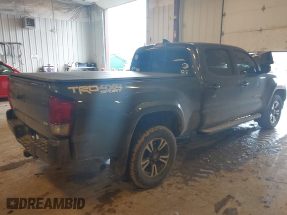 2016 Toyota Tacoma SR5 with VIN 5TFDZ5BN8GX012377, listed as a IAAI auction lot 41688620 with 138,531 mi miles and . Bid and sale history available at DreamBid. Image 4.