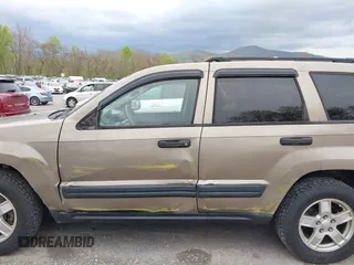 2005 Jeep Grand Cherokee Laredo with VIN 1J4GR48K35C510327, listed as a IAAI auction lot 42026081 with 260,377 mi miles. Bid and sale history available at carsss.com. Image 12.