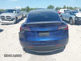2023 Tesla Model Y Performance with VIN 7SAYGDEF9PF582908, listed as a IAAI auction lot 41930957 with 52,857 mi miles and . Bid and sale history available at DreamBid. Image 15.
