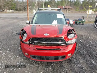 2015 MINI Countryman S with VIN WMWZC3C50FWT05122, listed as a IAAI auction lot 41572503 with 120,885 mi miles and . Bid and sale history available at DreamBid. Image 12.