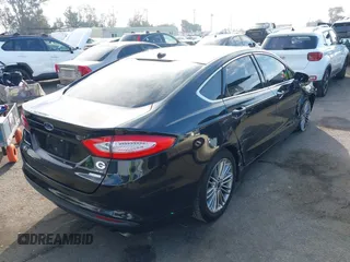 2014 Ford Fusion SE with VIN 3FA6P0HD4ER265241, listed as a IAAI auction lot 41473021 with 117,226 mi miles and . Bid and sale history available at DreamBid. Image 4.