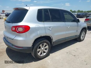 2010 Volkswagen Tiguan S with VIN WVGAV7AX5AW002380, listed as a IAAI auction lot 42604662 with 124,841 mi miles and . Bid and sale history available at DreamBid. Image 4.