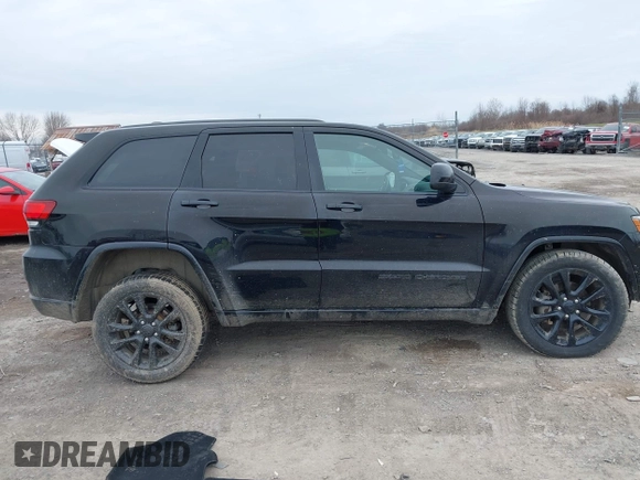2019 Jeep Grand Cherokee Laredo E with VIN 1C4RJFAGXKC674676, listed as a IAAI auction lot 41942125 with 72,151 mi miles. Bid and sale history available at carsss.com. Image 14.