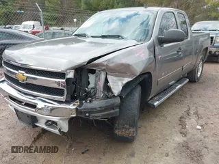 2012 Chevrolet Silverado 1500 LT with VIN 1GCRKSE76CZ228698, listed as a IAAI auction lot 42092011 with 184,322 mi miles. Bid and sale history available at carsss.com. Image 2.