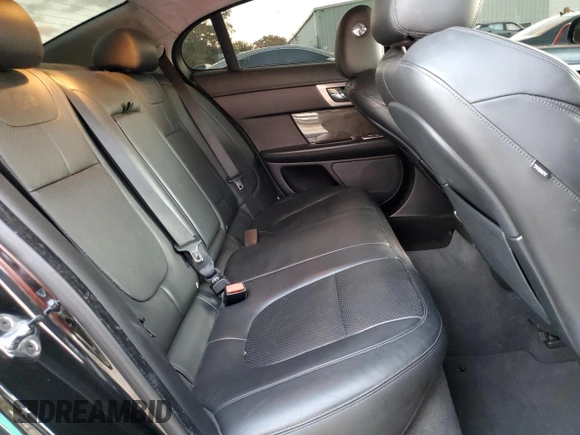2013 Jaguar XF with VIN SAJWA0JC4DMS64094, listed as a Copart auction lot 80721014 with 133,462 mi miles and Salvage Title. Bid and sale history available at DreamBid. Image 10.