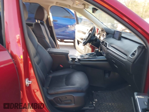 2019 Mazda CX-9 Touring with VIN JM3TCACY0K0310851, listed as a IAAI auction lot 42066395 with 91,046 mi miles and . Bid and sale history available at DreamBid. Image 5.