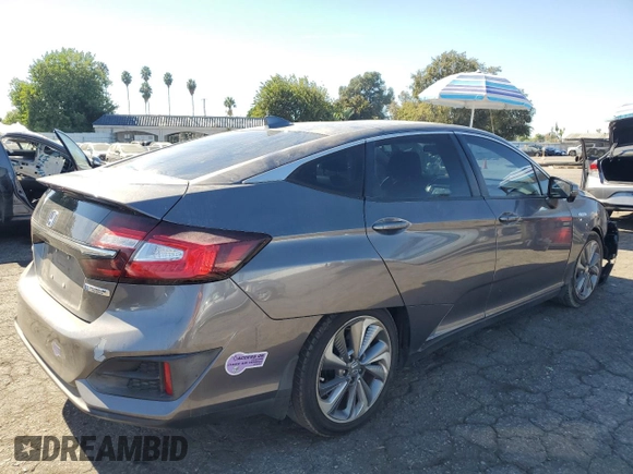 2018 Honda Clarity Plug-In Hybrid with VIN JHMZC5F17JC018537, listed as a Copart auction lot 77413144 with 74,350 mi miles and Salvage Title. Bid and sale history available at carsss.com. Image 3.