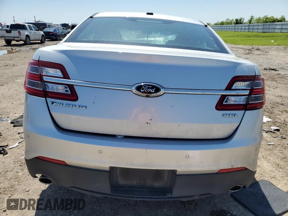 2015 Ford Taurus SEL z VIN 1FAHP2E85FG203397, wystawiony jako Copart lot #51821405 z przebiegiem 78 592 mil mil oraz Szkody całkowita. Historia ofert i sprzedaży dostępna na DreamBid. Obrazek 6.